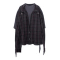 A dark gray and black plaid button-up shirt jacket with a hood, featuring silver metal D-rings on the hood and a dark gray t-shirt layered underneath, shown against a plain white background.