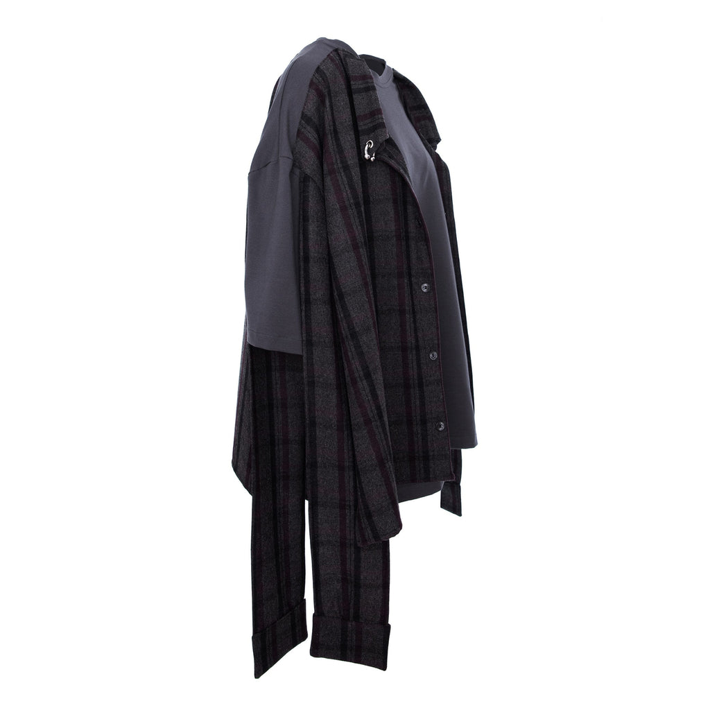 A dark gray and black plaid button-up shirt with contrasting solid dark gray sleeves, shown from the side against a plain white background.