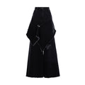 Black wide-leg denim pants featuring an asymmetrical draped wrap design with raw, frayed edges and distressed details, shown against a plain white background.