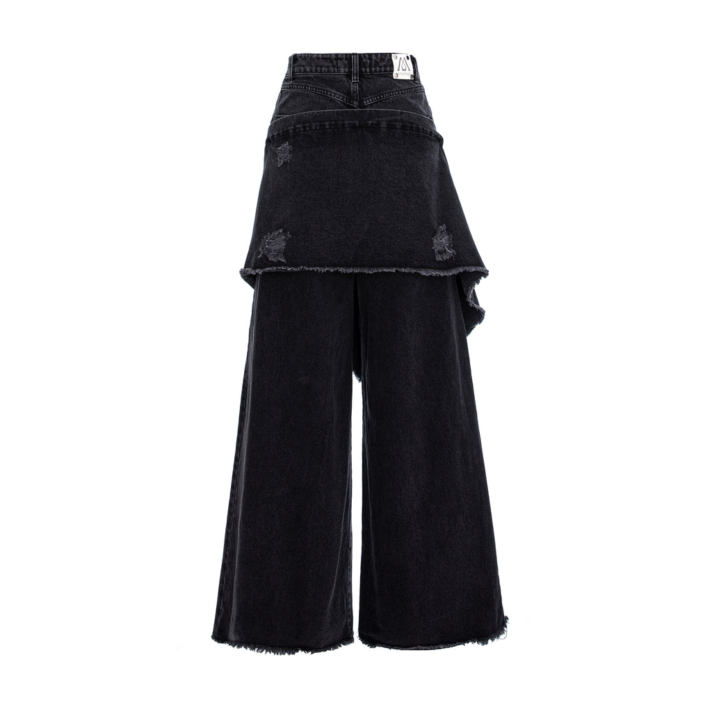 Black wide-leg denim pants featuring a layered, asymmetrical ruffle design with distressed details and raw frayed hems, shown against a plain white background.