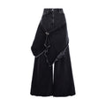 A black denim wide-leg skirt with an asymmetrical wrap design, raw frayed edges, and button details on the waistband, shown against a plain white background.