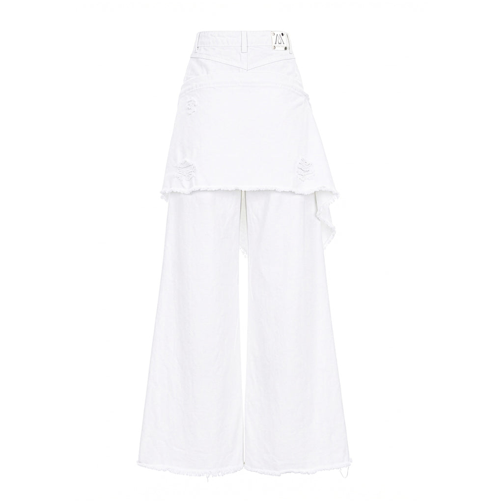 White high-waisted wide-leg pants featuring a layered asymmetrical ruffle overlay, distressed details, and raw frayed hems.